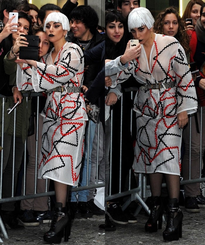 Lady Gaga outside her hotel in Milan wearing a see-through patterned outfit and a short bob-style white wig on November 6, 2014