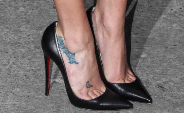 Lea Michele shows off her foot tattoo in black Christian Louboutin pumps