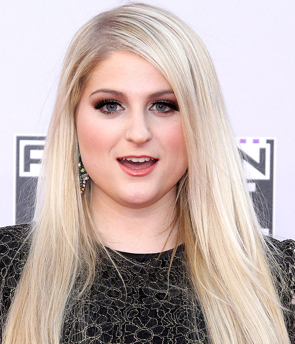 Meghan Trainor in a long-sleeved Ted Baker London lace dress