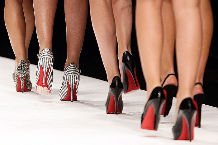 Models walking in Louboutins on the Fashion for Relief