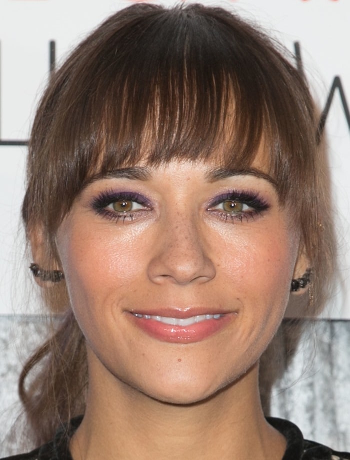 Rashida Jones showcases her chic look with subtle makeup and black jewel ear cuffs by Jack Vartanian