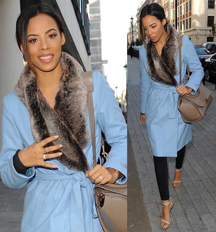 Rochelle Humes wears a pastel coat with a faux fur stole outside the BBC Radio 1 studios