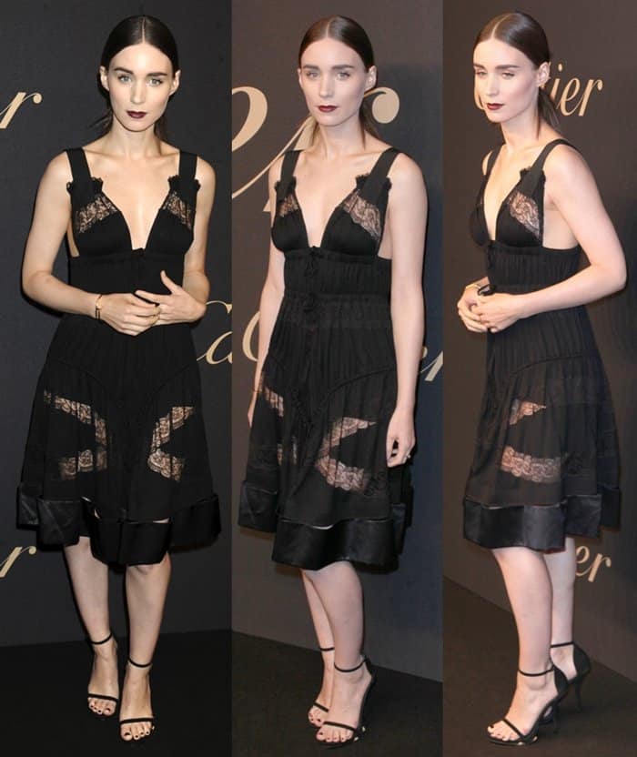 Rooney Mara flaunts her legs in a black lace-paneled dress from the Givenchy Spring 2015 collection with feminine details