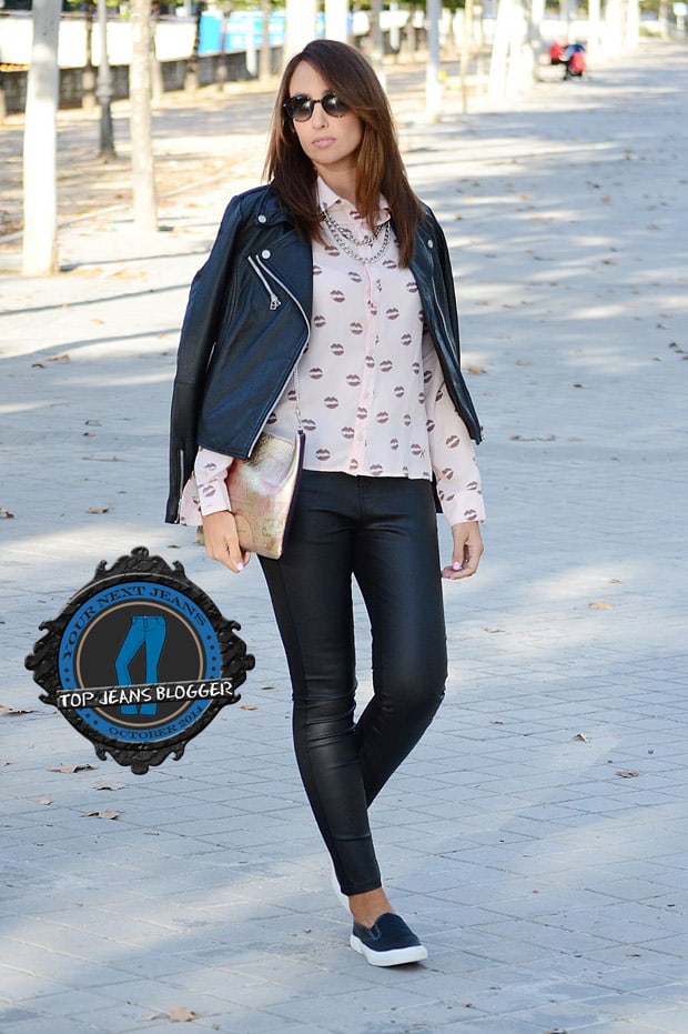 Silvia styled her leather pants with a printed button-down shirt, a moto jacket, and slip-on loafers