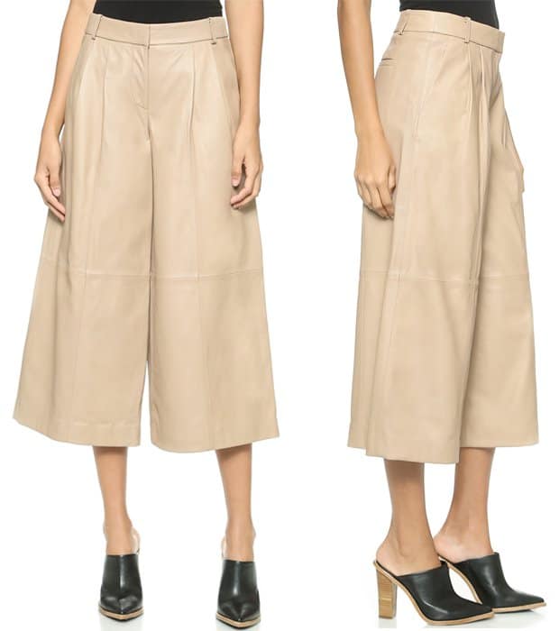 Pleating accentuates the cropped, wide-leg cut of these leather Tibi pants