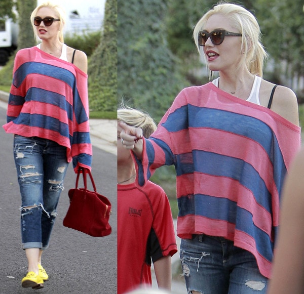 Gwen Stefani rocks a striped pink and blue shirt with destructed boyfriend jeans