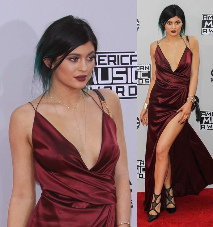 Kylie wearing a low-cut split-front gown by Alexander Vauthier and mesh pumps by Tamara Mellon for the 2014 American Music Awards