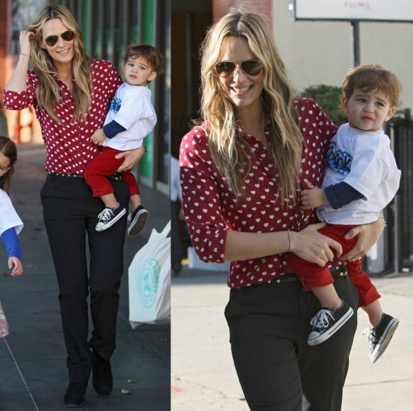 Molly Sims looked chic in a red, heart-print blouse, black slacks, and suede shoes