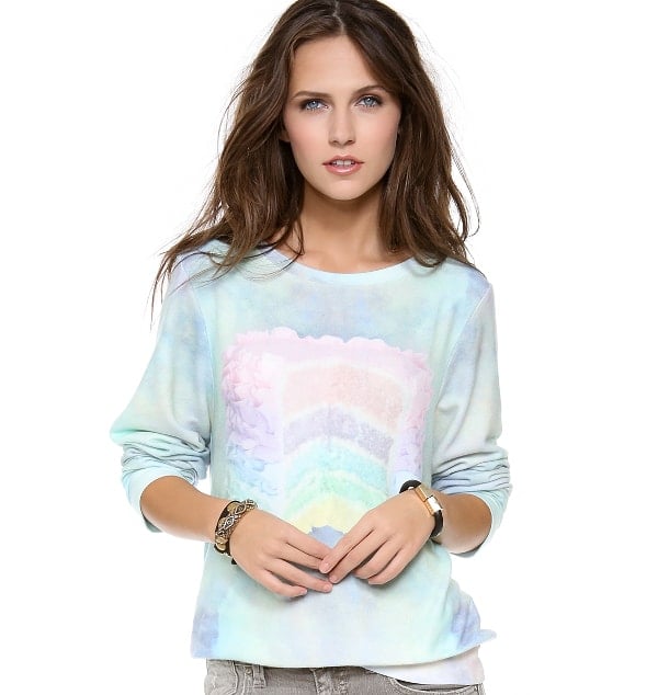 Rendered in a dreamy print, this ribbed sweatshirt is accented with a sweet cake graphic