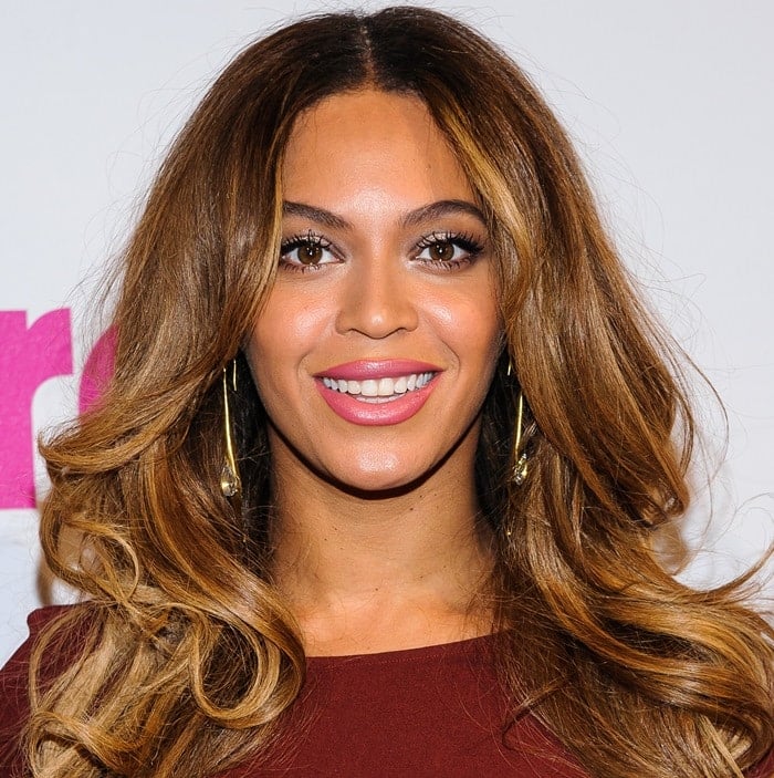 Beyoncé Giselle Knowles-Carter exuded sultriness in a stunning Haute Hippie merlot side-knot dress at the 2014 Billboard Women in Music Luncheon