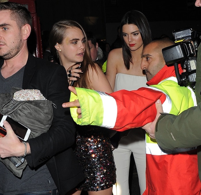 Cara Delevingne and Kendall Jenner leaving the British Fashion Awards 2014 afterparty at the Royal Cafe hotel in London, England, on December 1, 2014