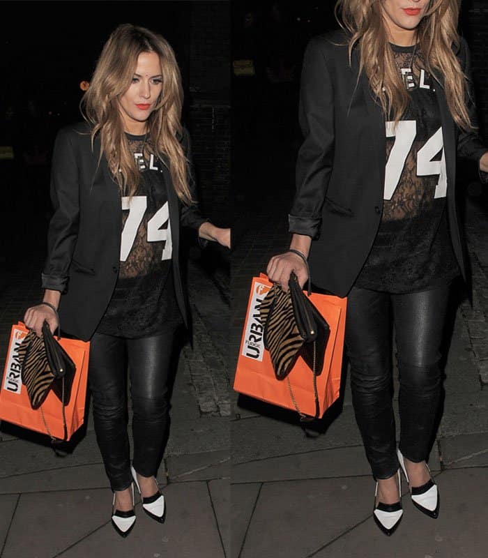 Caroline Flack in leather pants and chic blazer, March 25, 2014