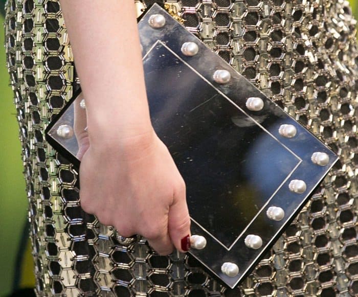 Christina Hendricks totes Charlotte Olympia's Mirror Mirror Pandora clutch