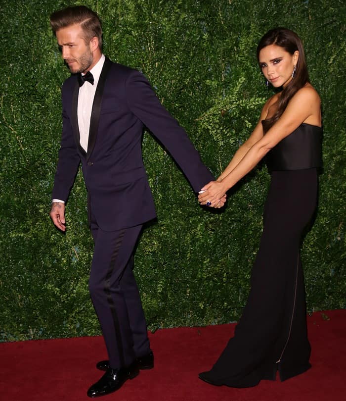 David was dressed in a stylish navy tuxedo, while Victoria wore a stunning strapless gown from her own fashion collection, priced at approximately £2,800