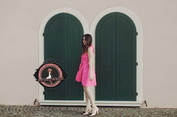 Francesca teams her feminine pink dress with blush pink slingback pumps