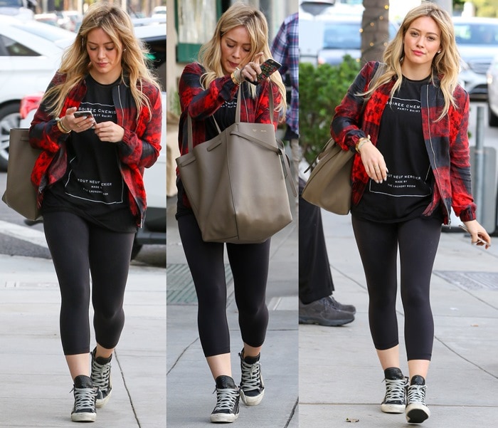 Hilary Duff rocks yoga tights paired with distressed hi-top sneakers