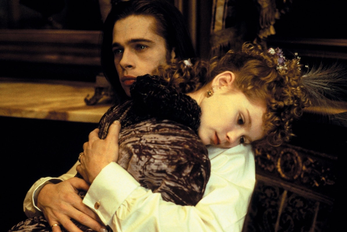 Brad Pitt as Louis de Pointe du Lac and Kirsten Dunst as Claudia in Interview with the Vampire (1994), depicting the complex relationship between the vampire and his surrogate daughter