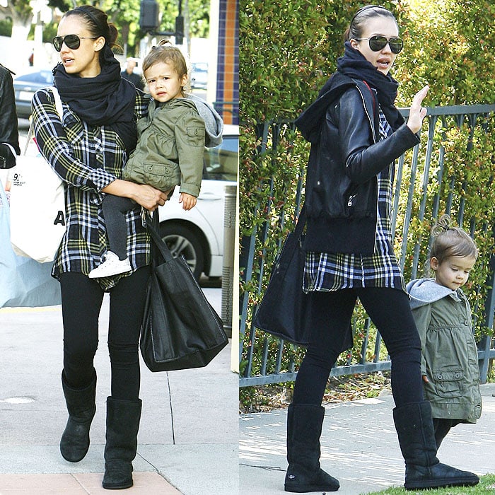 Jessica Alba nails the effortless grunge look with a plaid shirt, leather hoodie, leggings, and Ugg boots while shopping for Easter eggs with daughter Honor Marie in Los Angeles on April 3, 2010