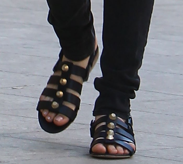 Kaley Cuoco shows off her feet in flat Balenciaga leather sandals