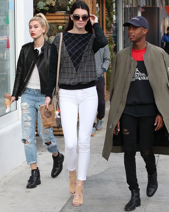 Kendall Jenner, Shamari Maurice, and Hailey Baldwin visiting Sprinkles Cupcakes (Kendall with a cupcake and Hailey with a chocolate ice cream cone) in Beverly Hills, Los Angeles, on December 17, 2014