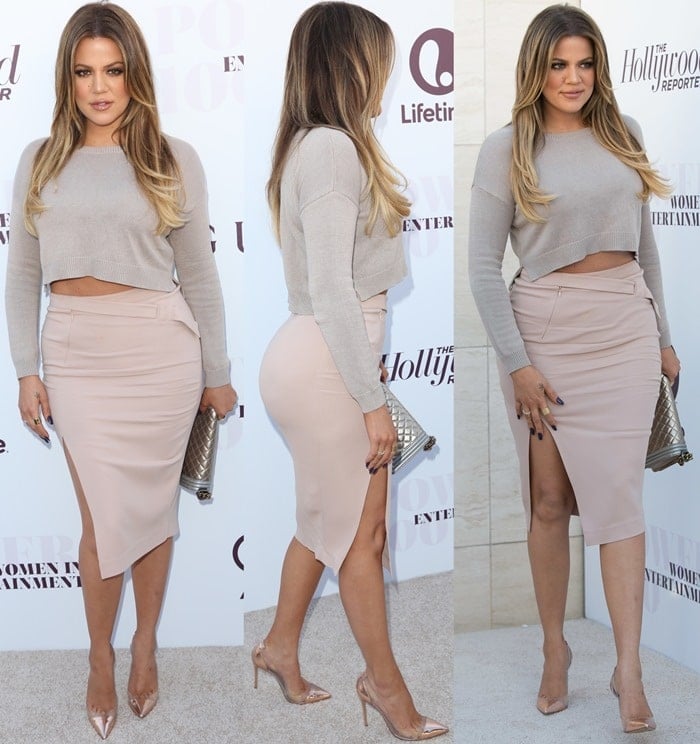Khloe Kardashian flashes her midriff in a side-slit fitted midi skirt by A.L.C.