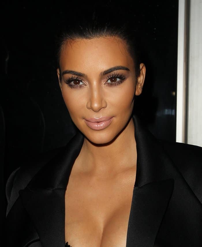 Kim Kardashian attends Rihanna's Diamond Ball, looking glamorous with a sleek hairstyle and flawless makeup