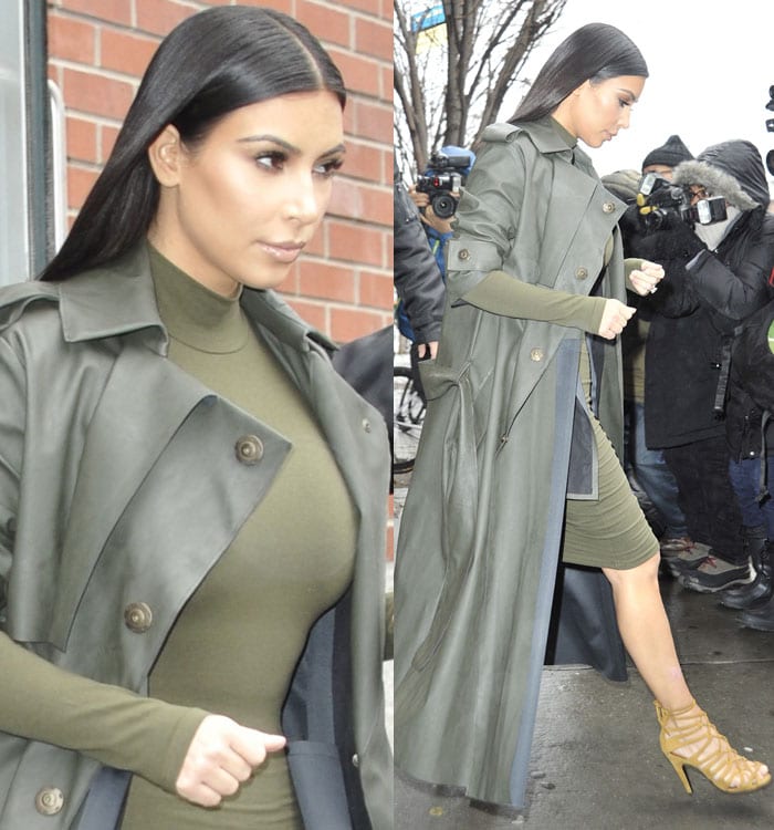 Kim Kardashian wears an olive-colored dress and a Lanvin trench coat