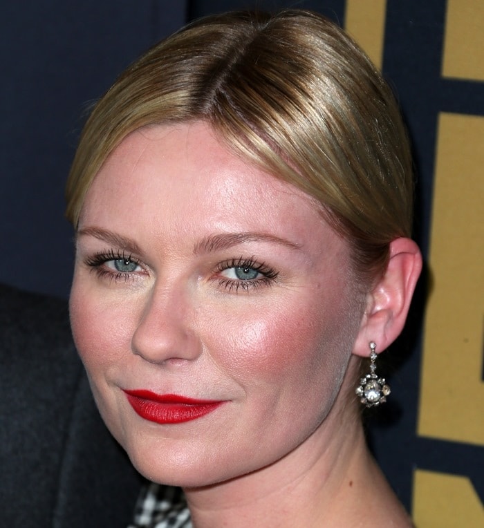 Kirsten Dunst shows off her sparkling diamond earrings