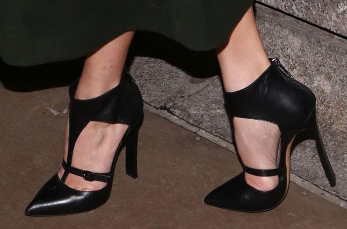 The Casadei pumps’ sculptural cutouts and curved heel design added edge to LeAnn’s polished holiday look
