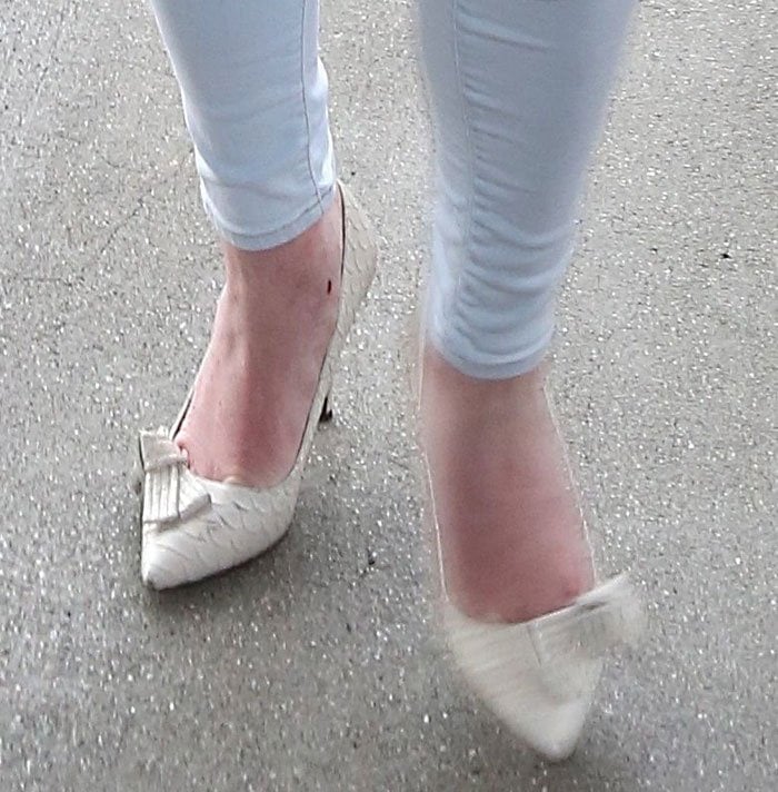 Lindsay Lohan wears embellished Isabel Marant shoes