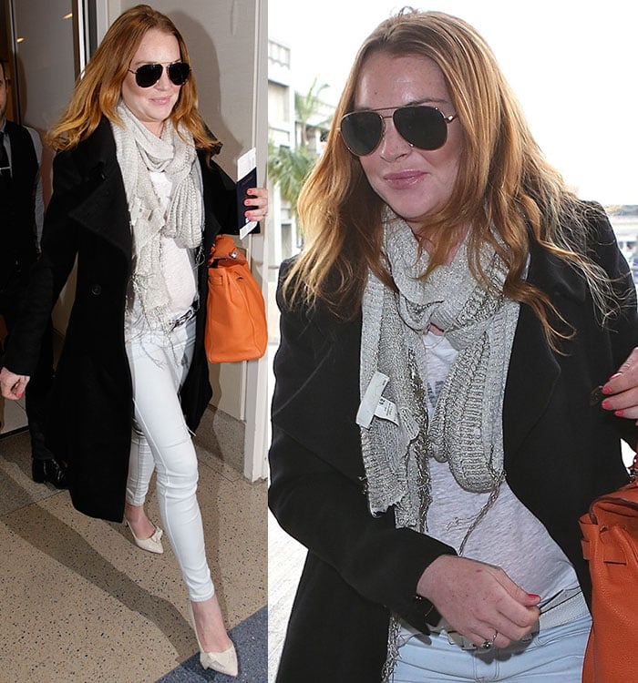 Lindsay Lohan styled a black coat with a scarf, a gray top, and skinny jeans