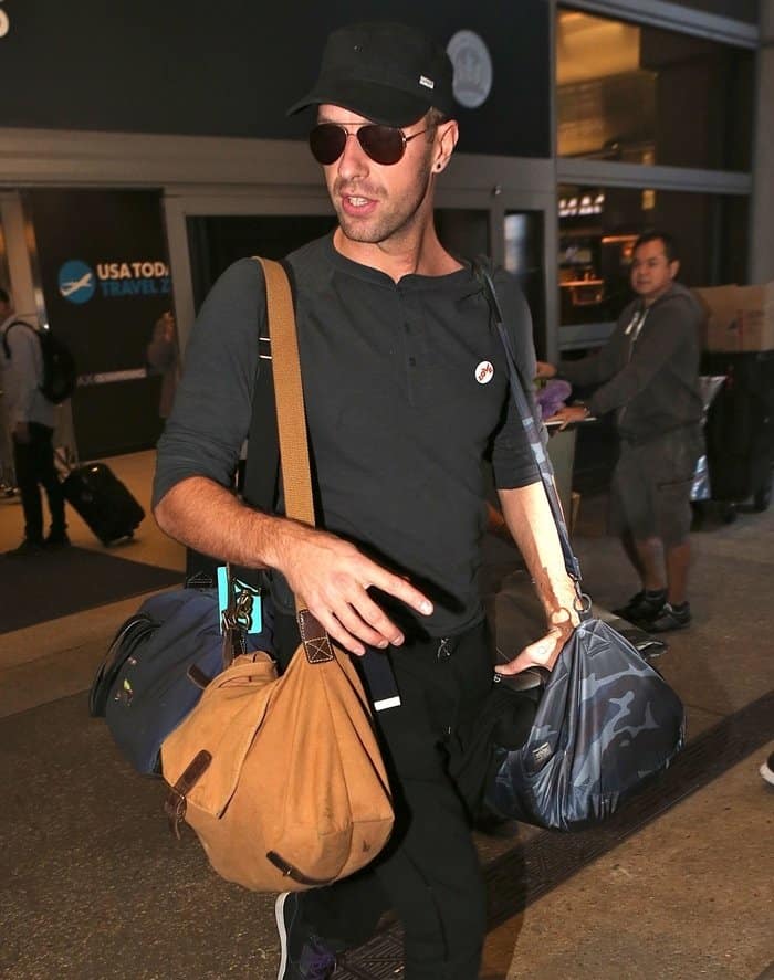 Chris Martin spotted arriving at LAX on December 14, 2014