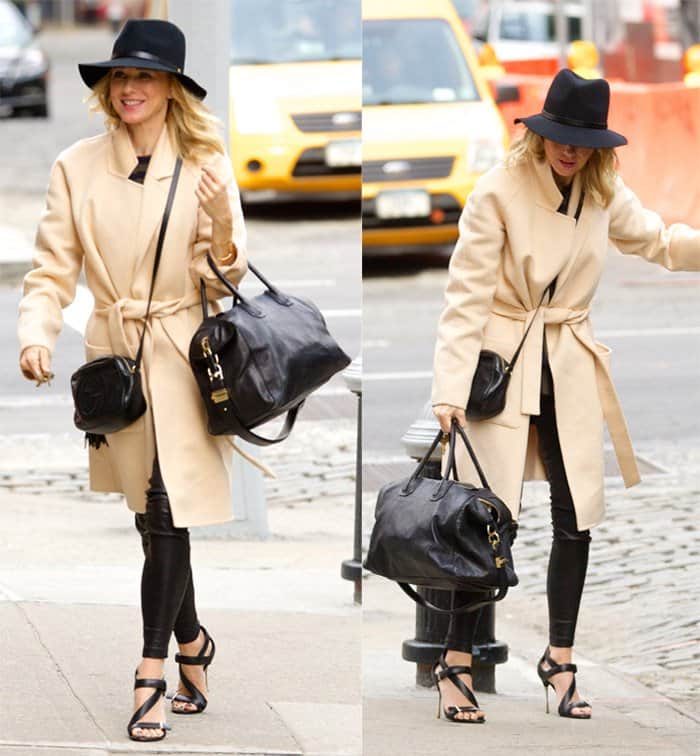 Naomi Watts out and about in New York City wearing a large black hat, beige cashmere coat, leather pants, high heel shoes and carrying two Givenchy bags in New York on October 20, 2014