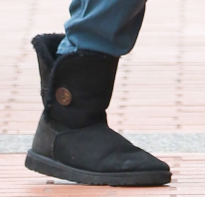 Nikki Reed wears black UGG Bailey Button boots