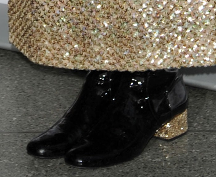 Pixie Lott in knee-high boots from Saint Laurent