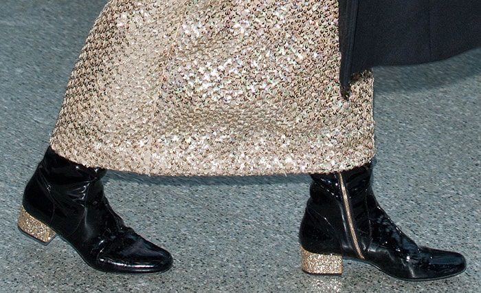 Pixie Lott wearing glitter-covered Saint Laurent boots