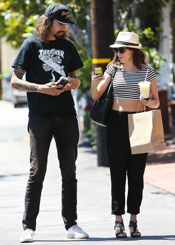 Rose McGowan and a friend leaving Fred Segal in West Hollywood on August 23, 2013