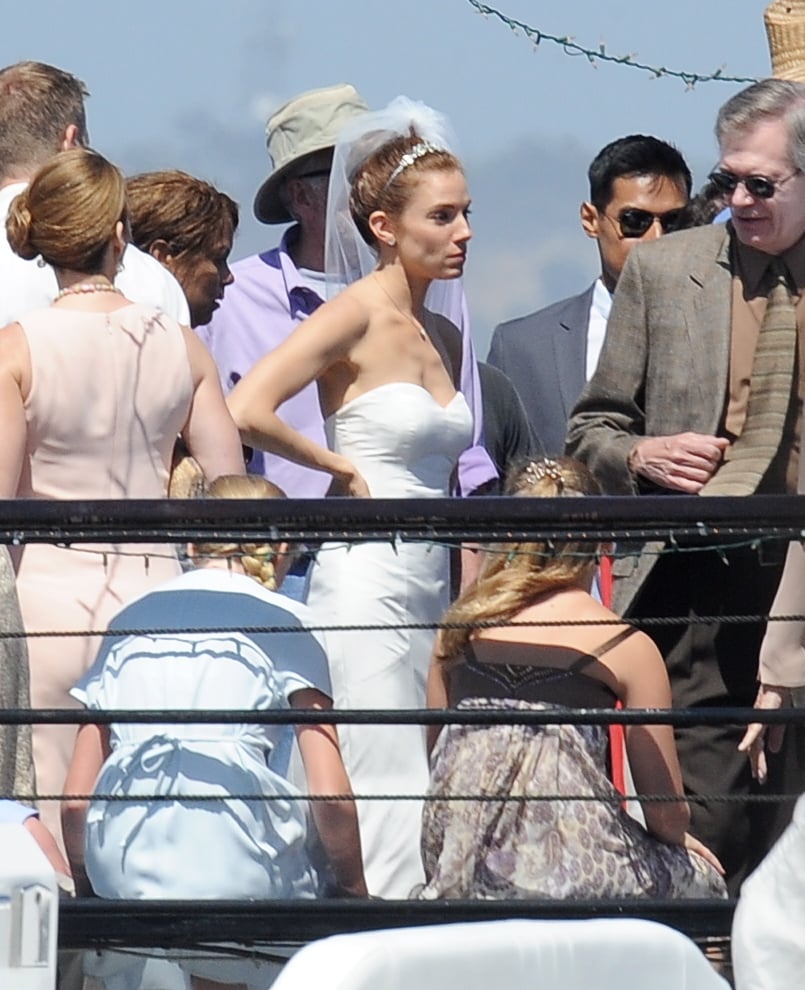 Sienna Miller films a wedding scene on the set of American Sniper in a strapless bridal gown