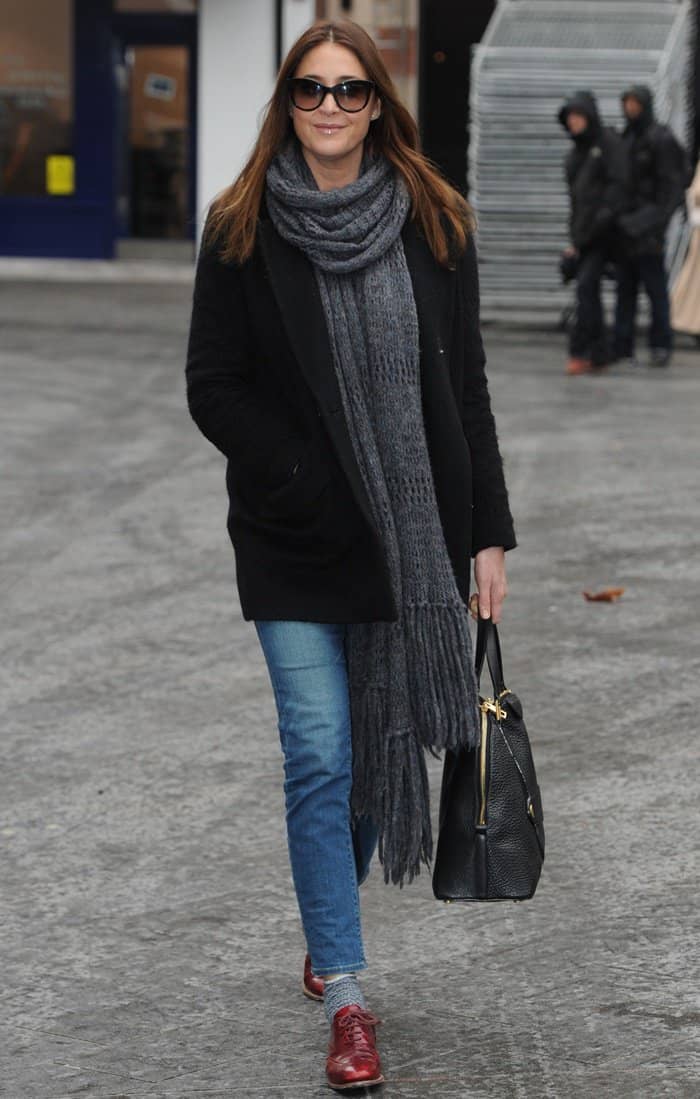 Lisa Snowdon in brogues paired with jeans as she leaves Global House in Central London