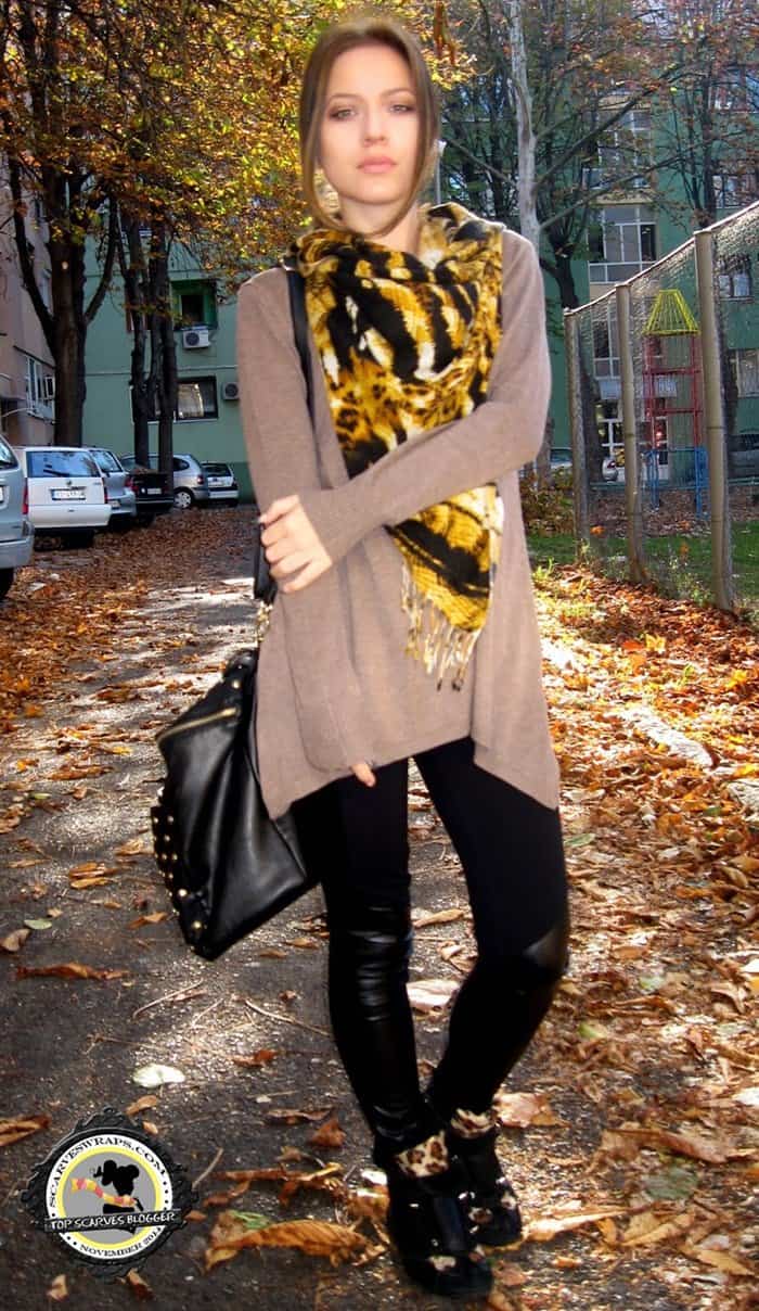 Marija wore a tiger print scarf with leopard shoes and leather pants