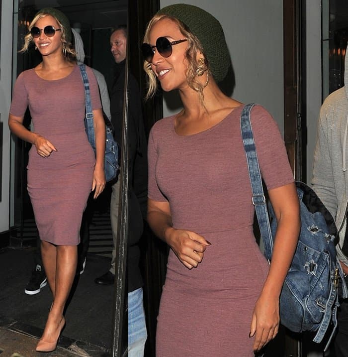 Beyoncé keeps it casually chic in a fitted mauve dress, nude pumps, and a distressed denim backpack while stepping out for dinner with Jay-Z at Cecconi’s in London on March 7, 2014