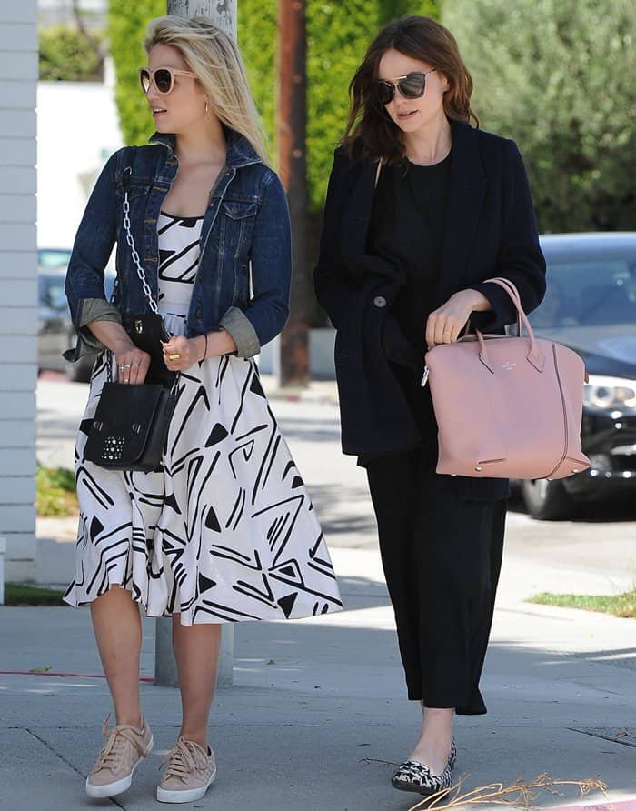 Dianna Agron and Carey Mulligan stroll through West Hollywood on April 26, 2014, looking effortlessly chic in stylish monochrome outfits and designer handbags