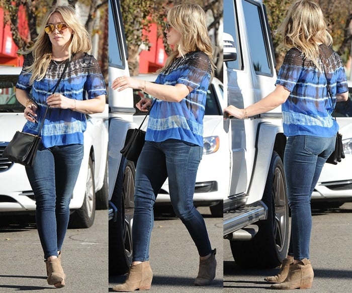 Hilary Duff perfects casual street style in a breezy tie-dye blouse, dark skinny jeans, and suede ankle booties, effortlessly blending comfort with chic