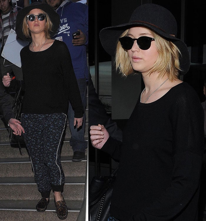 Jennifer Lawrence styled floral-printed track pants with a black top