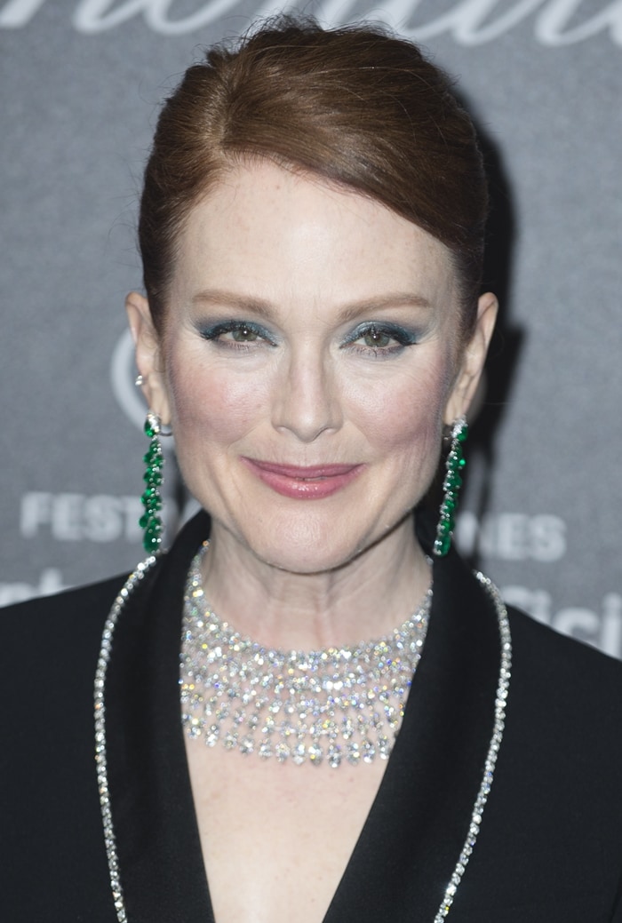 Julianne Moore's diamond-trimmed suit and emerald earrings