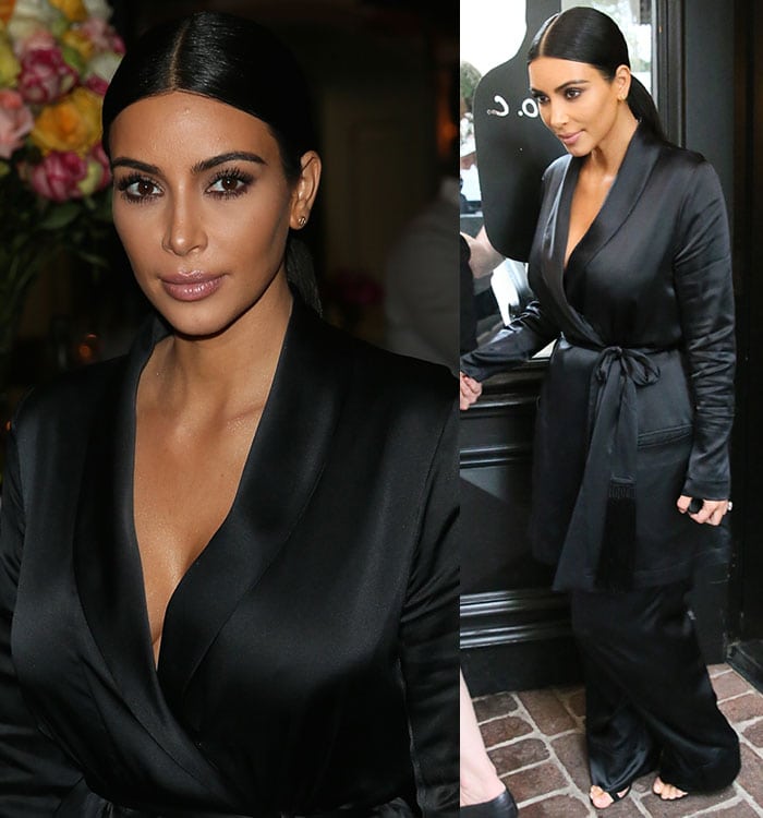 Kim Kardashian wearing a Stella McCartney satin jumpsuit with a matching robe