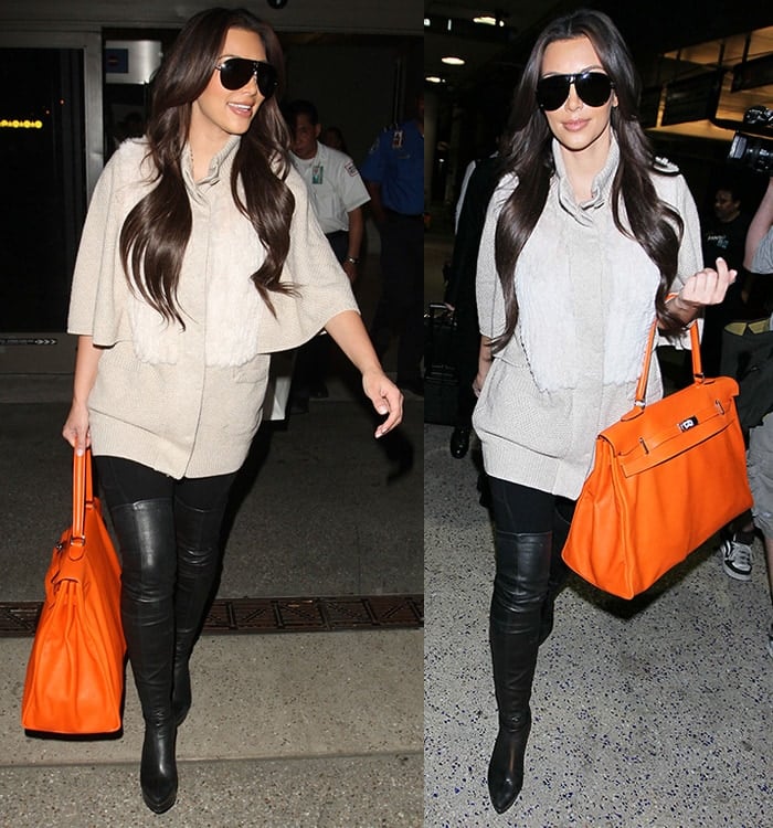 Kim Kardashian makes a stylish airport statement with sleek black over-the-knee boots and a bold orange Hermès handbag