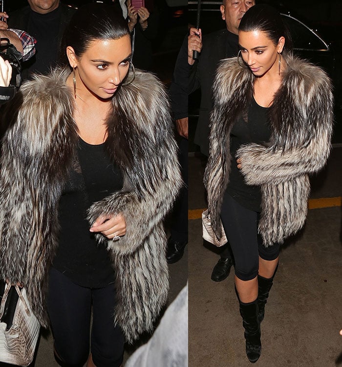 Kim Kardashian wore her hair in a slick ponytail