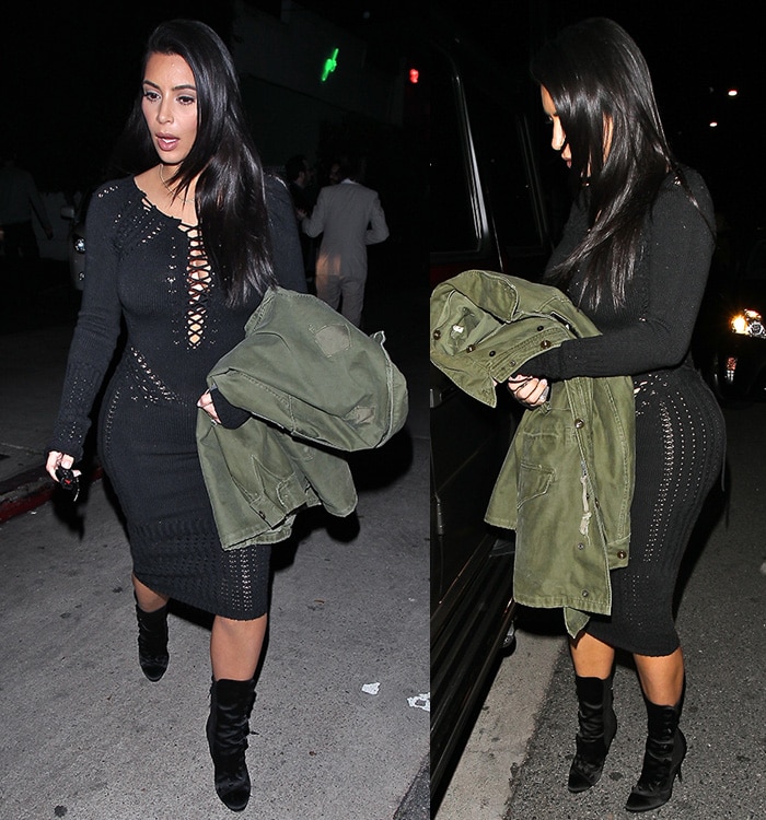 Kim Kardashian with an army green jacket slung over her arm