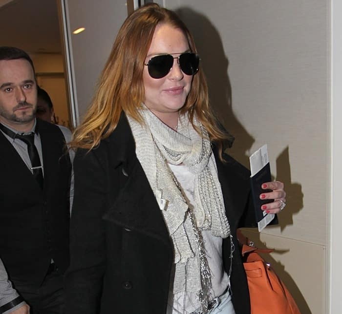 Lindsay Lohan arriving at LAX on December 30, 2014